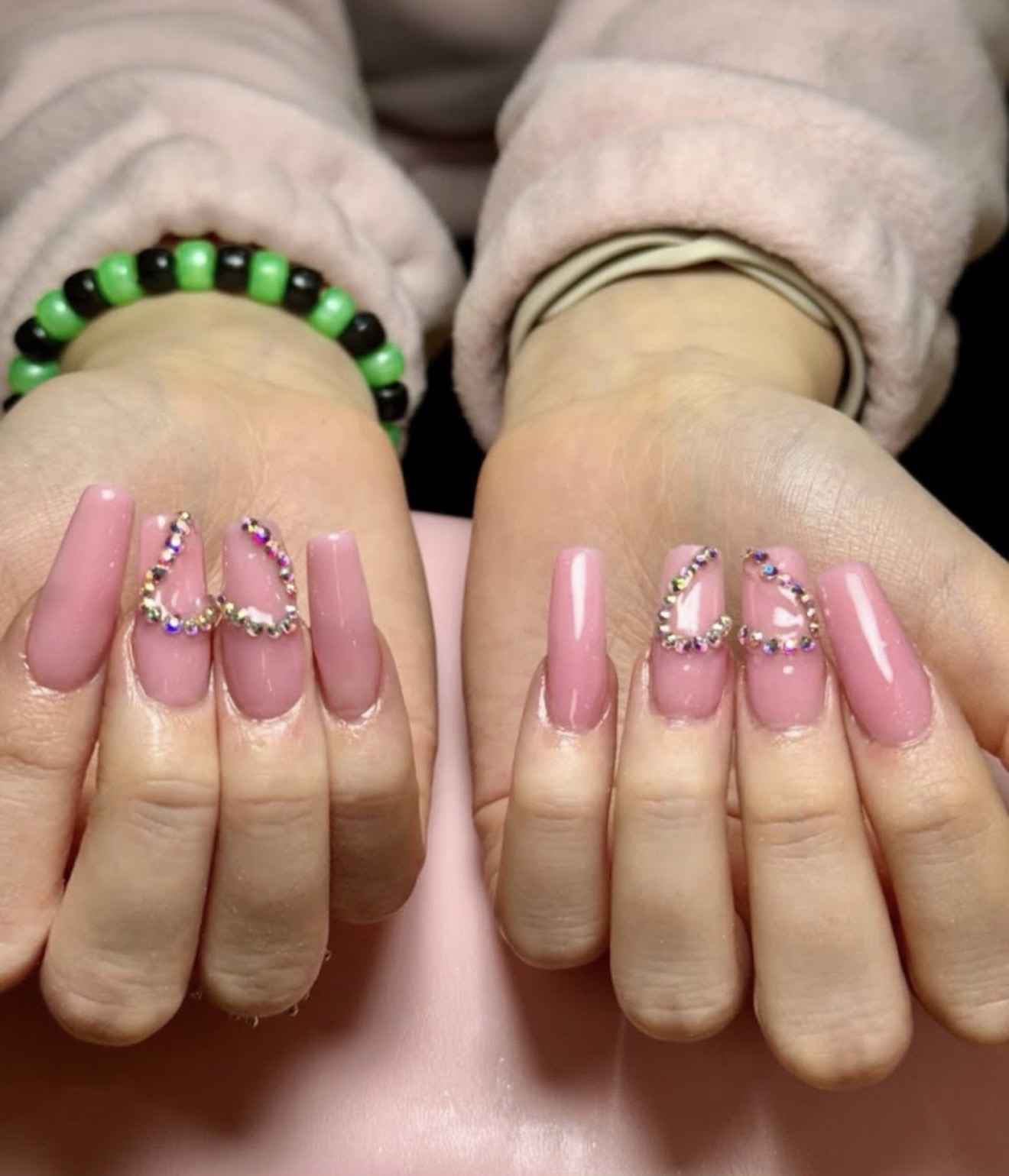 Mauve nails with crystal heart design